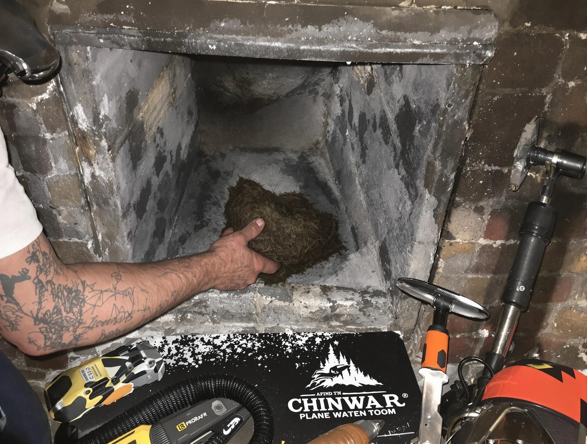 Monessen Chimney Sweep safely removing debris and screening chimney in Monessen, PA